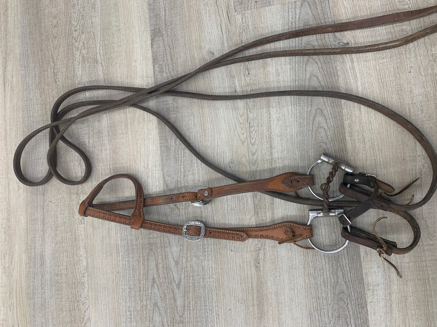 Used Headstall with twisted wire bit and reins