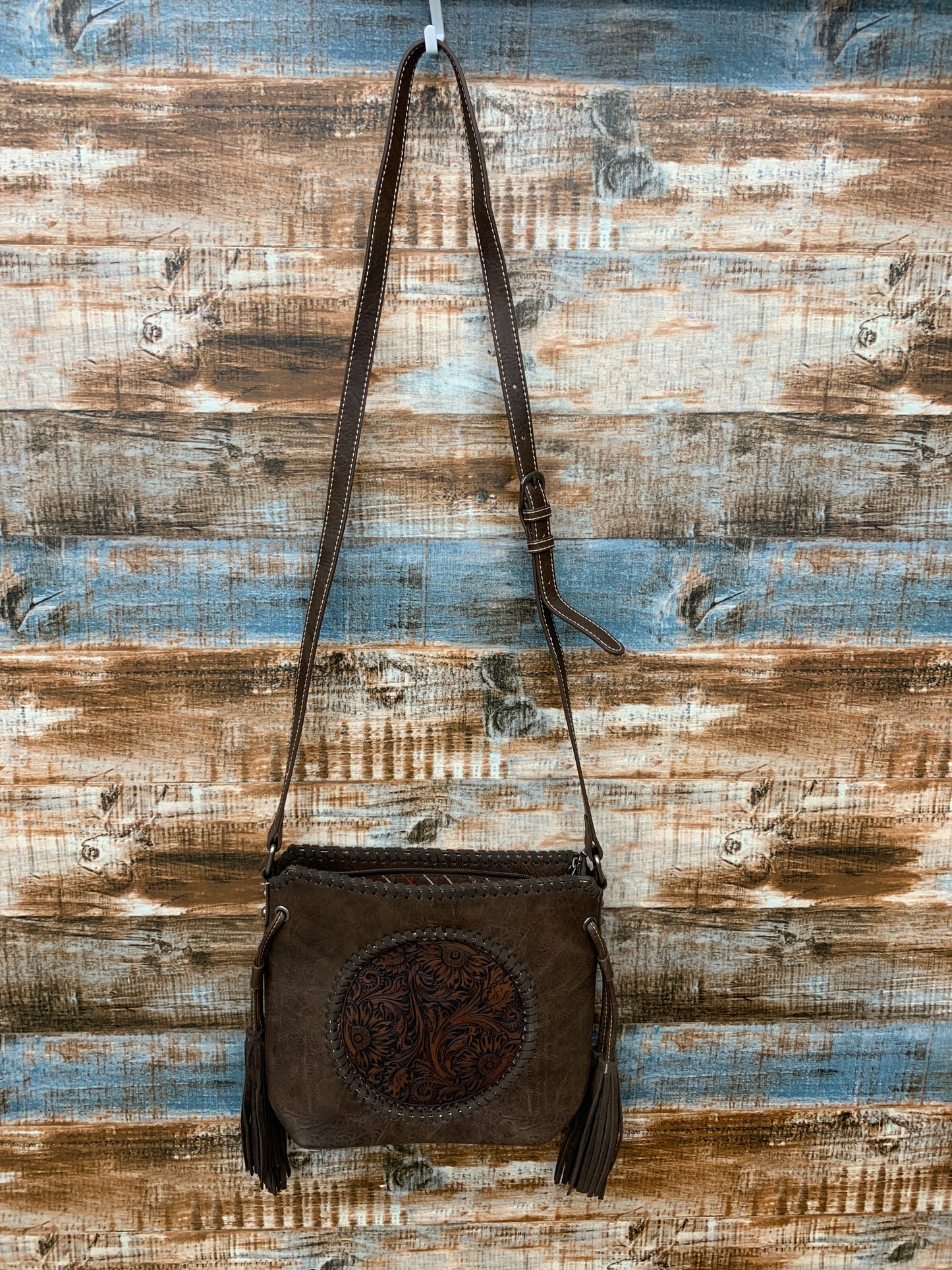 Montana West Embossed collection cross body with fringed tassels